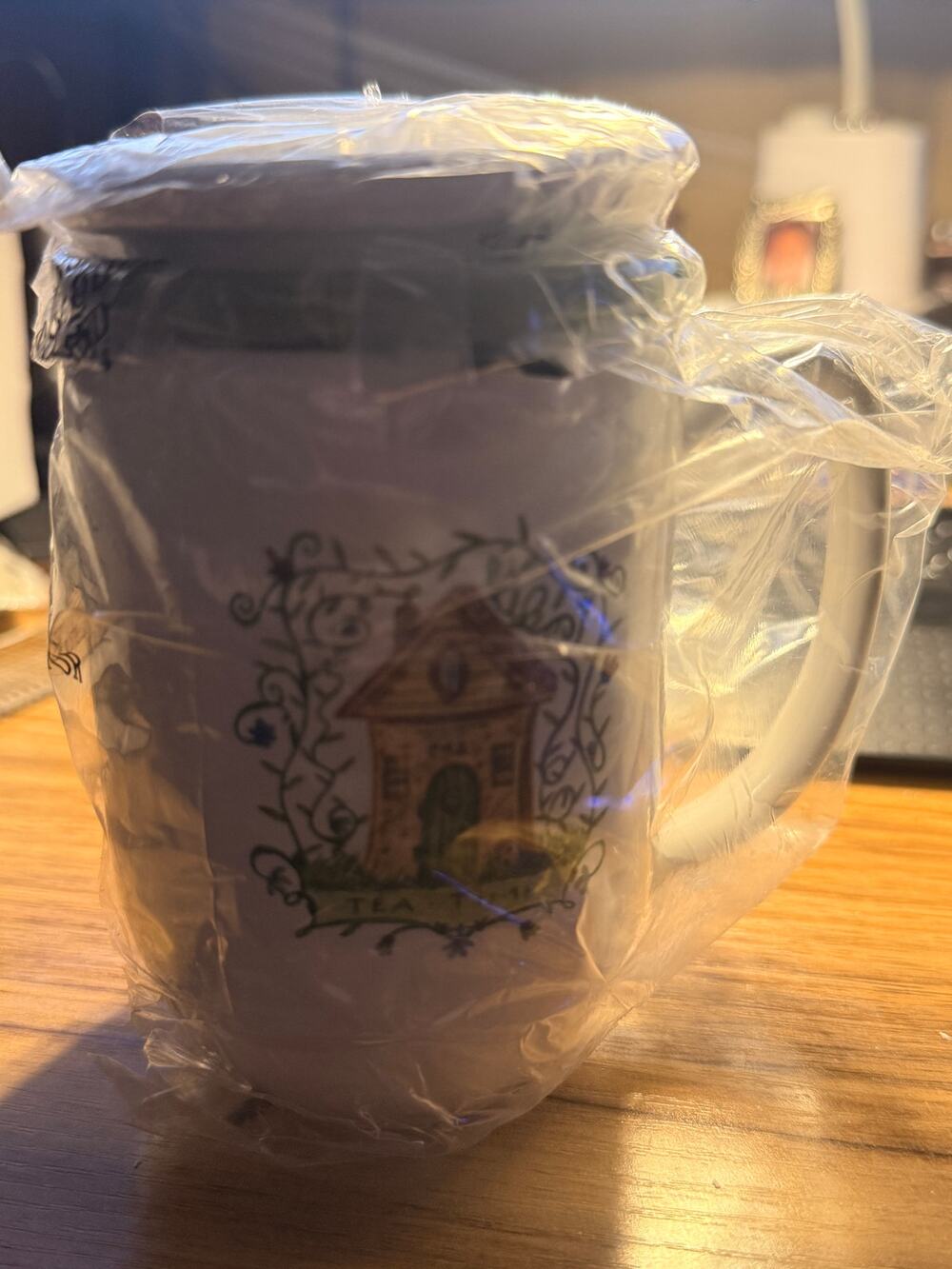 DEMDACO Tea Garden Reflections Ceramic Teacup Infuser with Lid, Botanical